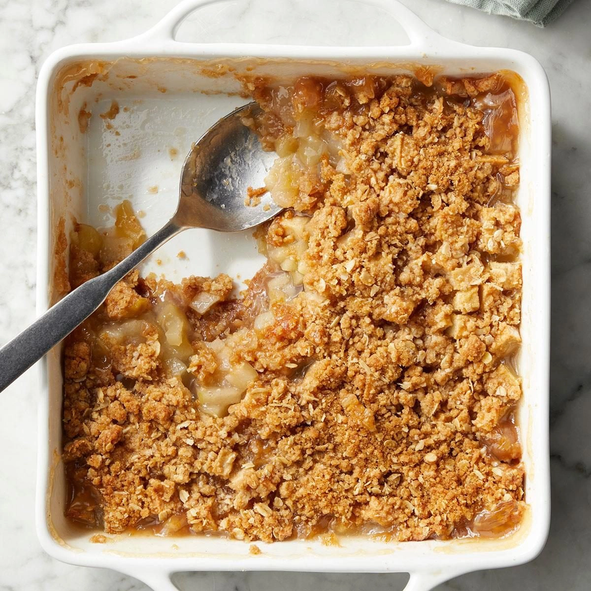 Photo of appke crisp dessert in a square pan.